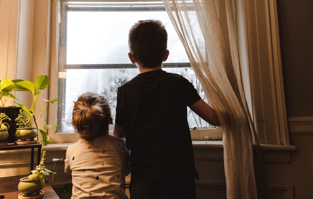 kids looking outside window